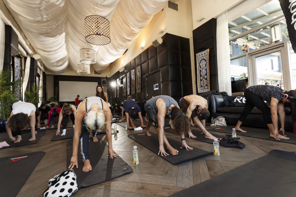 Silent Spin Class and Silent Yoga in NYC